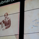 A previously unknown portrait, c. 1868, of abolitionist and Underground Railroad conductor Harriet Tubman is projected on a screen before the unveiling of the photograph at The Smithsonian’s National Museum of African American History and Culture in Washington, on March 25, 2019.